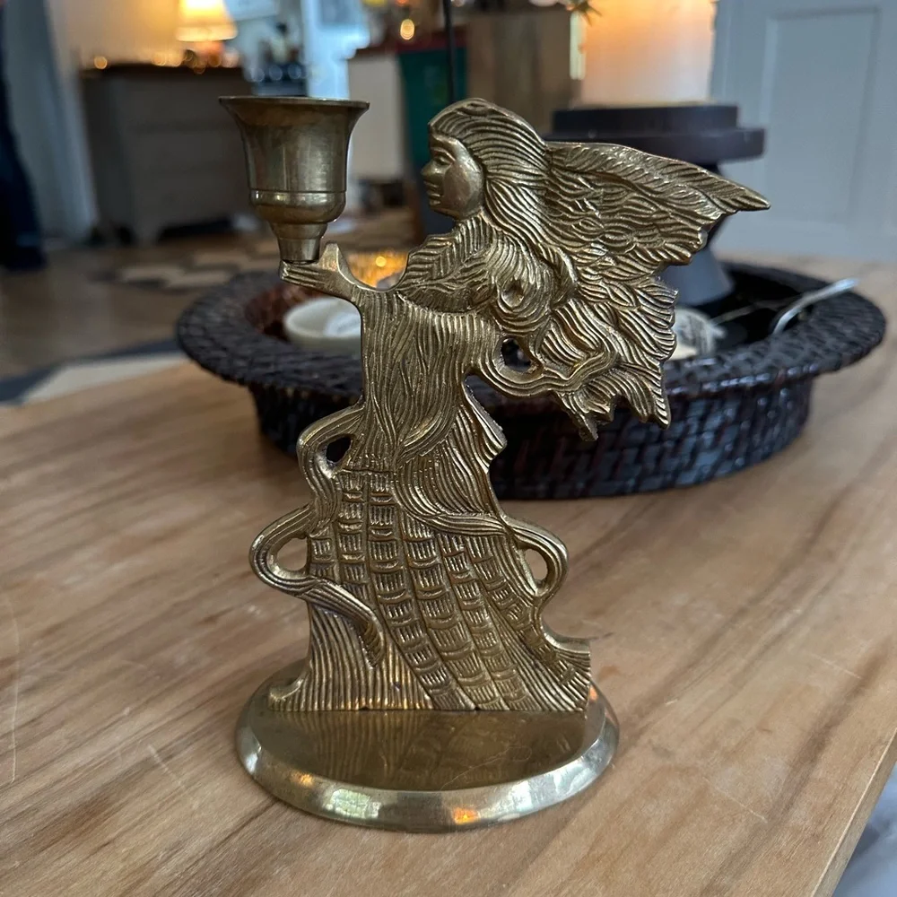 Elegant vintage brass Angel candle holder.  About 8”H Imperfection shown at base